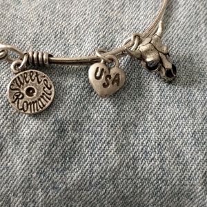 Bangle bracelet with charms